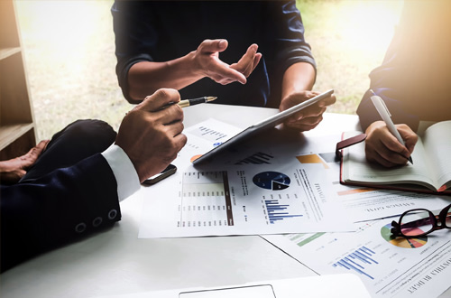 group of people working at a table